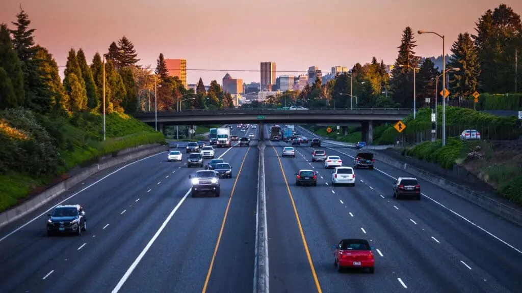 A busy highway shows the importance of studying traffic patterns before placing homebuilder signage.