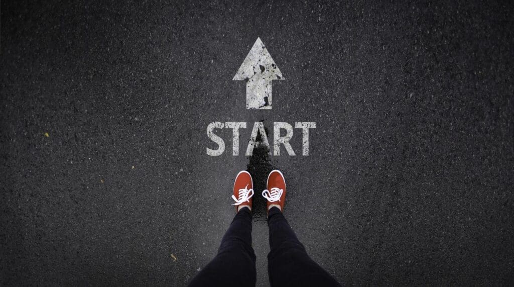 A runner stands at the start line, illustrating a builder starting a homebuilder business.