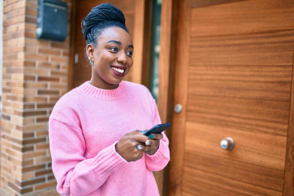 Woman engaging with homebuilder text marketing