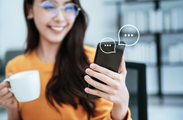 Satisfied customer texting with conversational AI