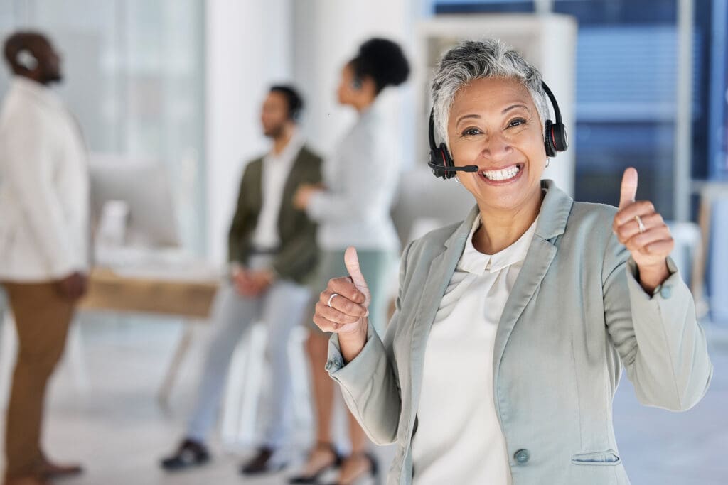 Happy, older, female call center employee