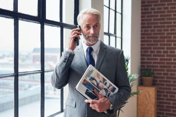 Older businessman on the phone