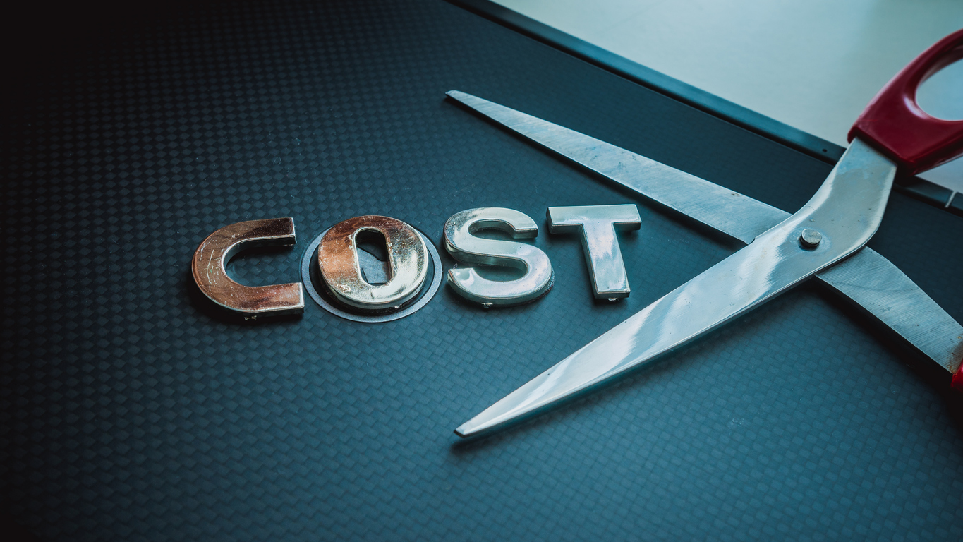 Scissors represent cutting student acquisition costs. 