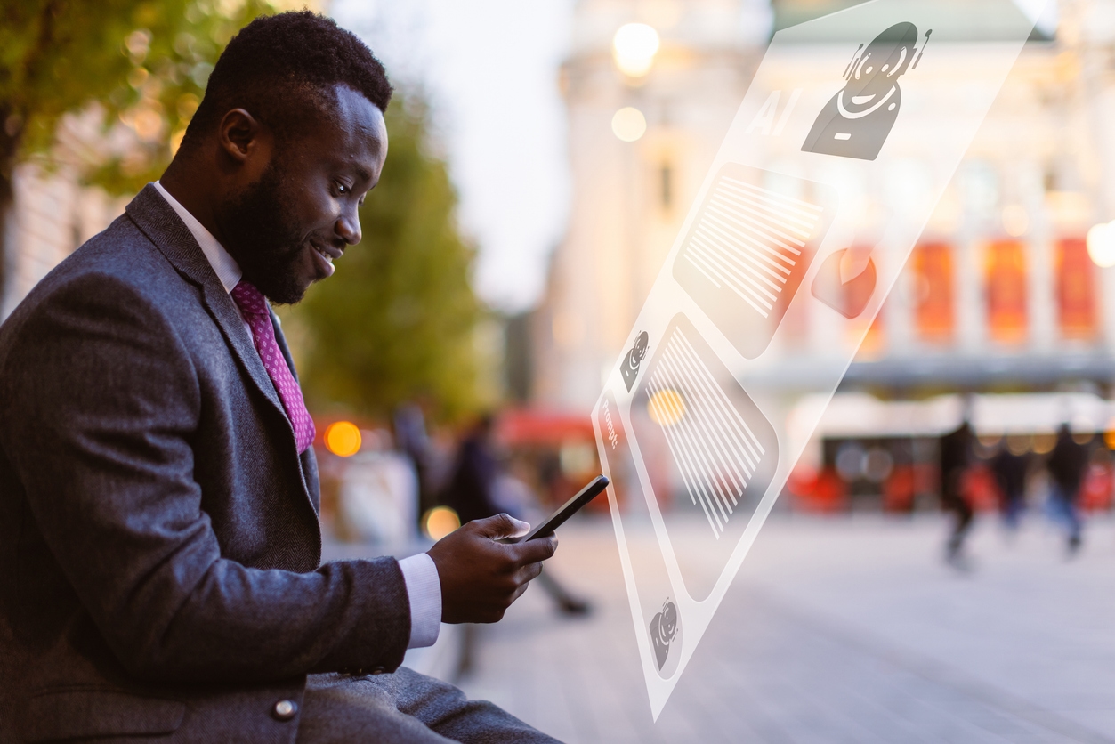 Man reads messages sent by a chatbot through a home builder marketing strategy