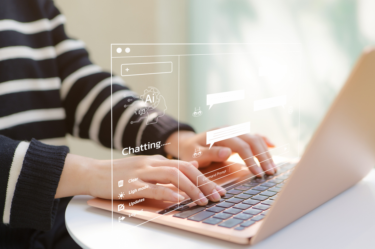 Woman using a laptop uses an AI Chatbot to get information.