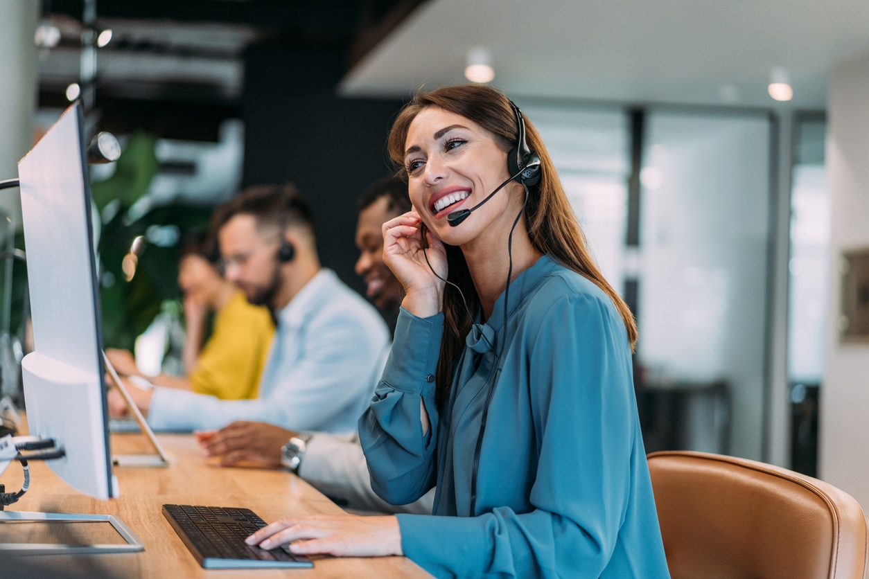 A customer service rep answers a call that was transferred after the customer spoke with the chatbot.