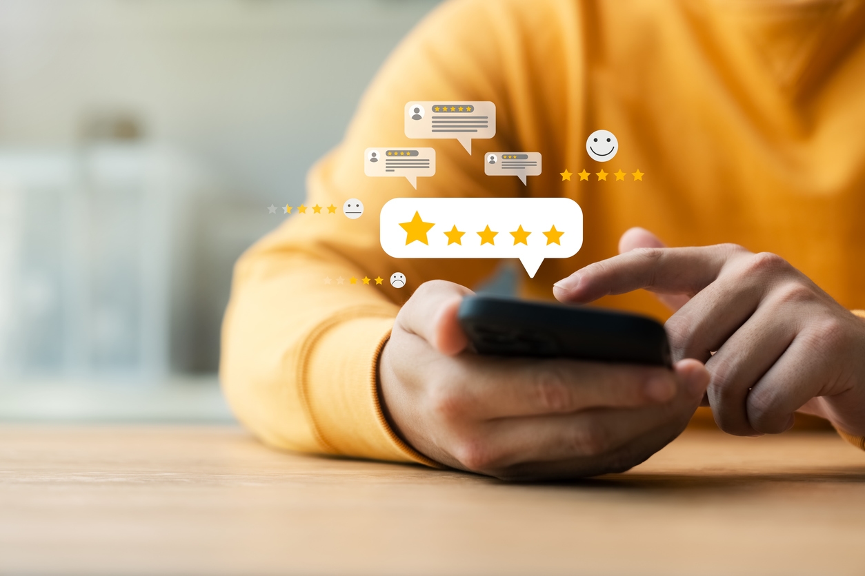 User gives a 5 star rating via his phone for the excellent customer experience. 