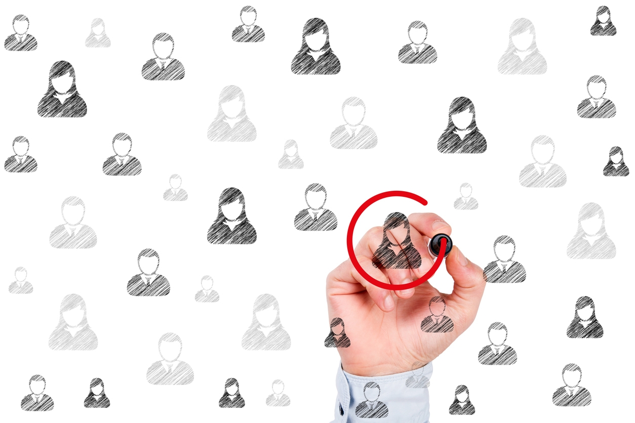 Someone circles a figure on a clear board illustrating personalized lead engagement.