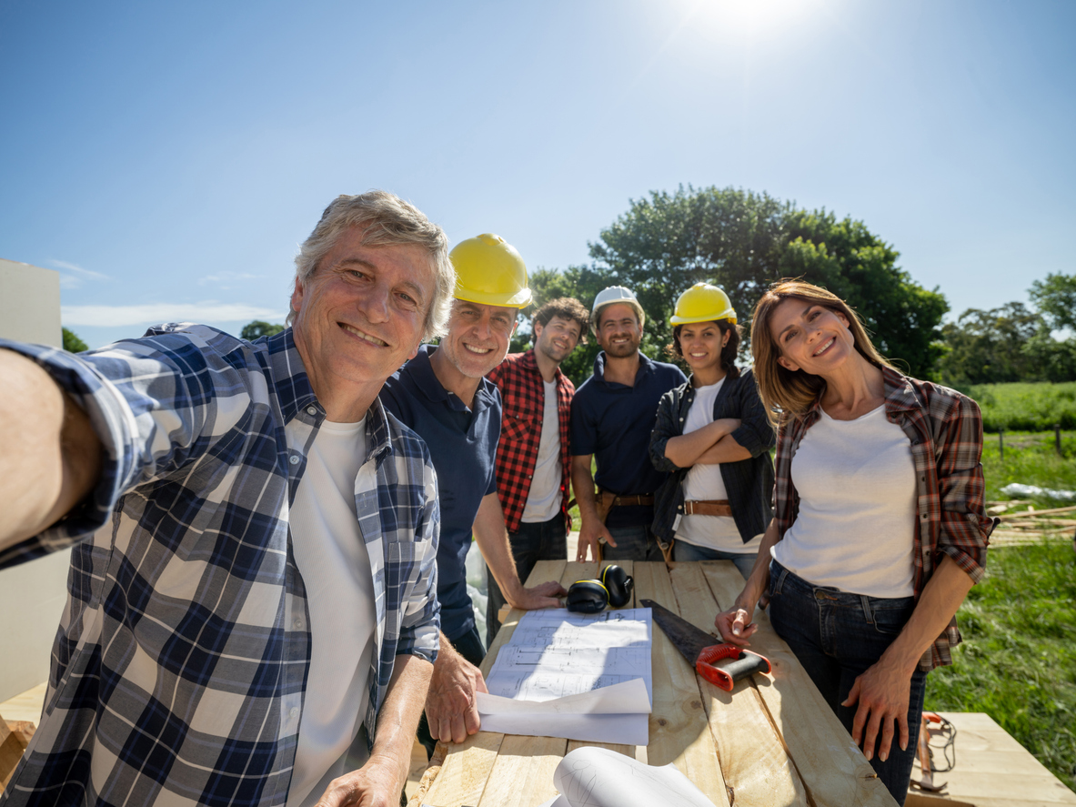 Selfie of a homebuilding team, showing a great way to brand.