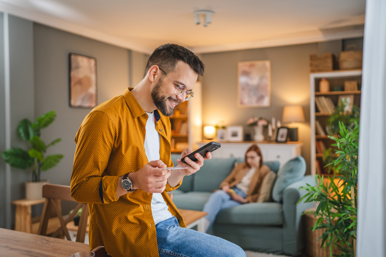 Homeobuyer enters information online through AI Digital assistant gathering info on his buyer's journey.