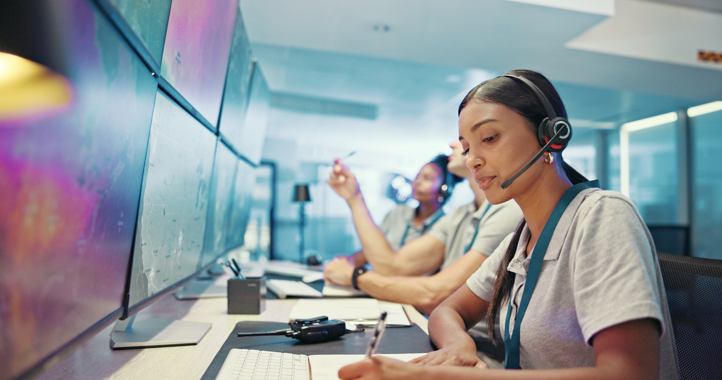 A sales development representative team answers calls from leads.