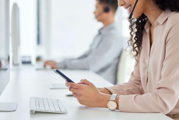 Call center agent texting customers