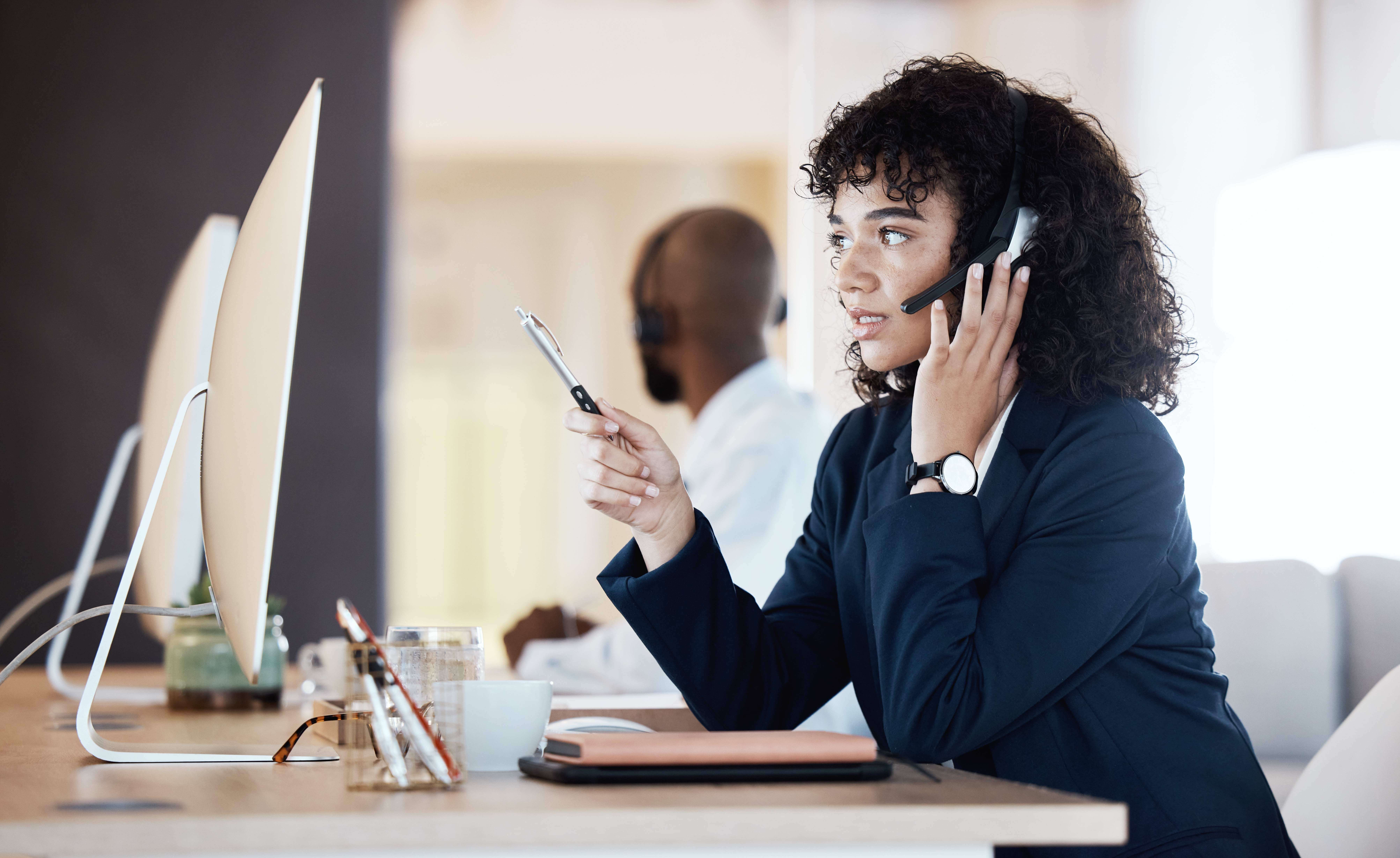 Agent talking to a customer that used call center SMS to communicate key information before the call