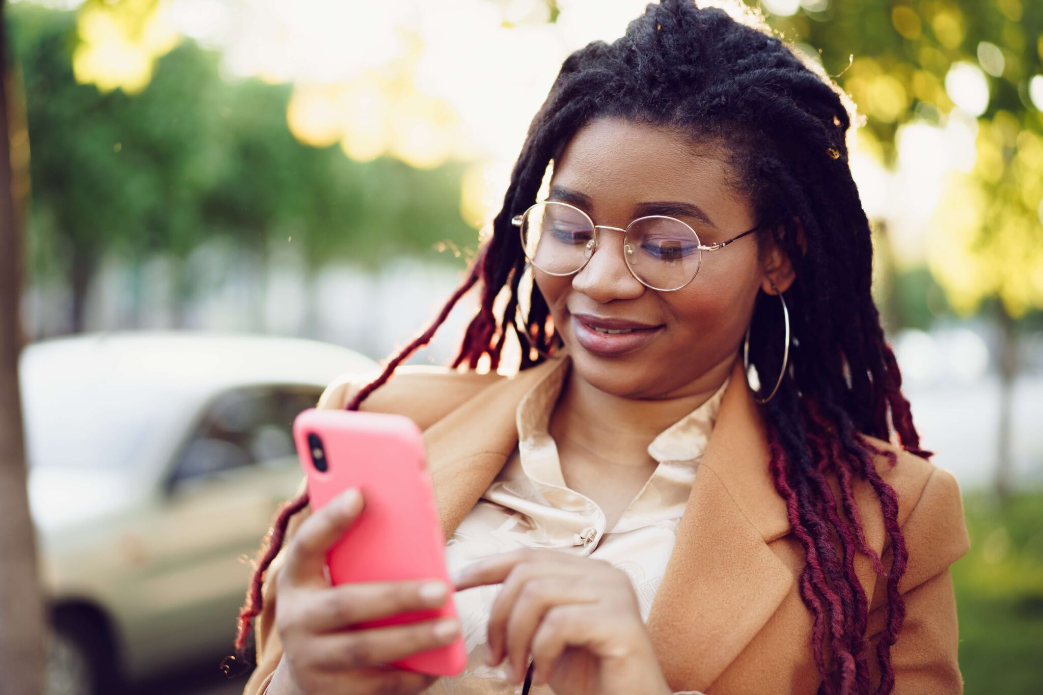 Woman using conversational SMS to text a brand