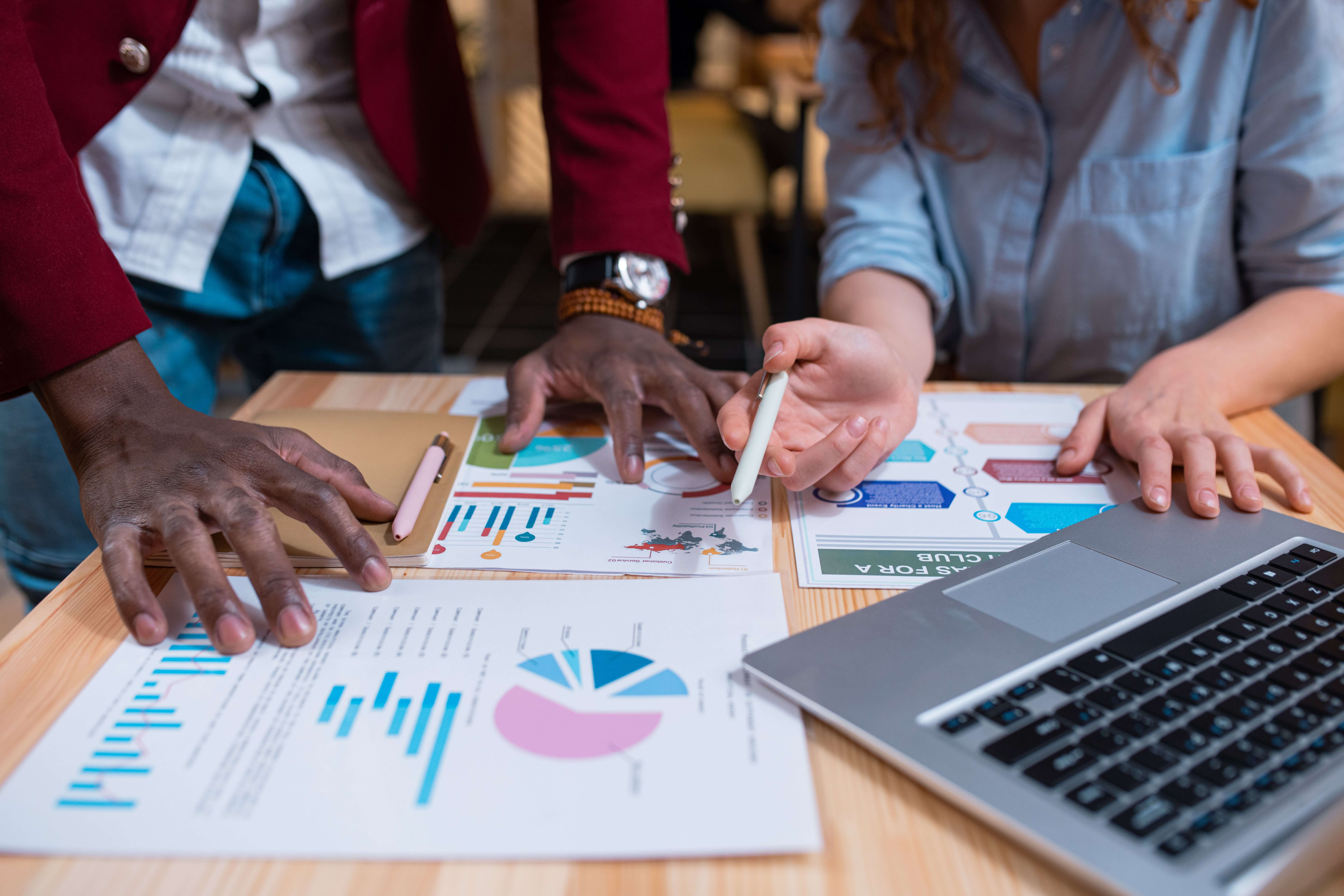 Marketing team analyzing lead sources