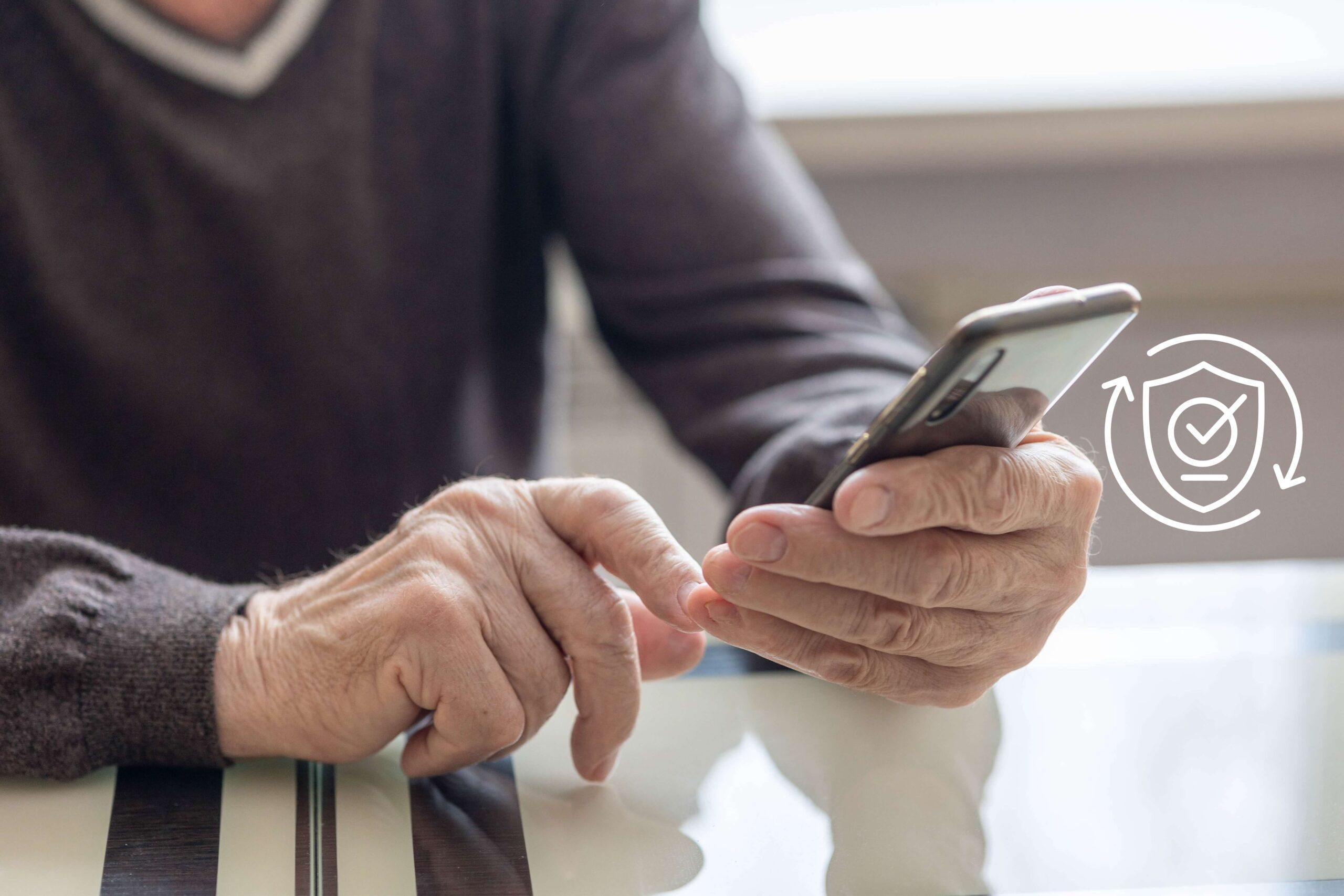 Close up of person texting with SMS compliance icon