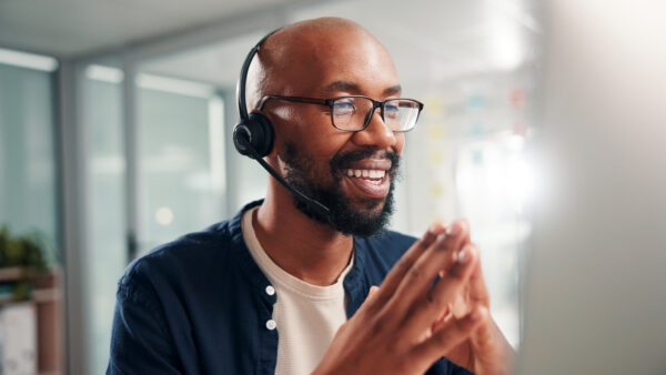 A customer service representative takes a call after the customer interacted with an AI assistant.