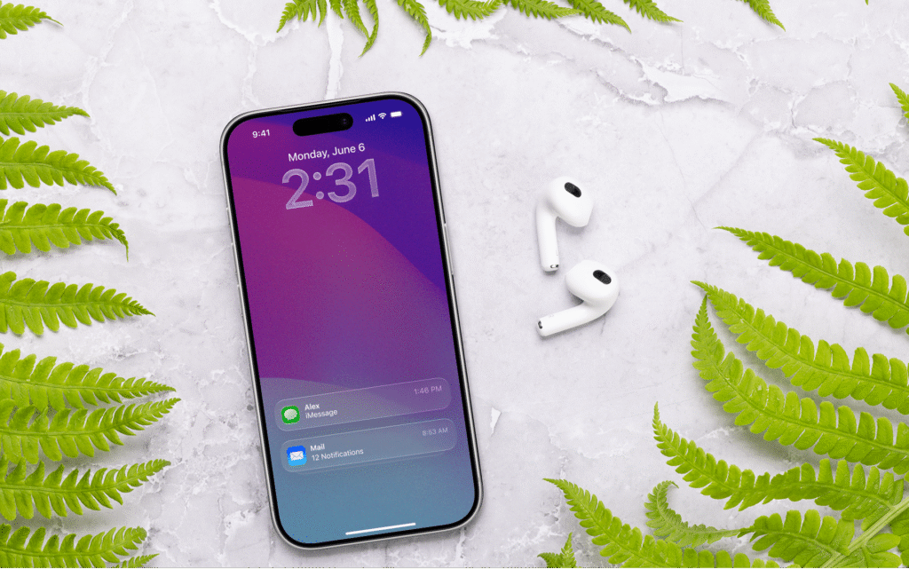 Smartphone on a marble background with SMS and email notifications