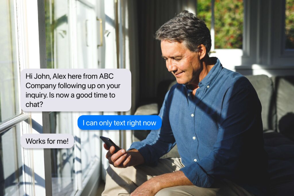 Man uses AI texting to interact with a brand