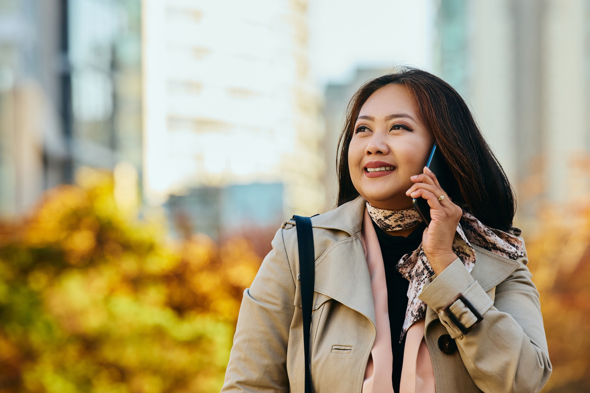 Woman interacts with AI voice agent over the phone