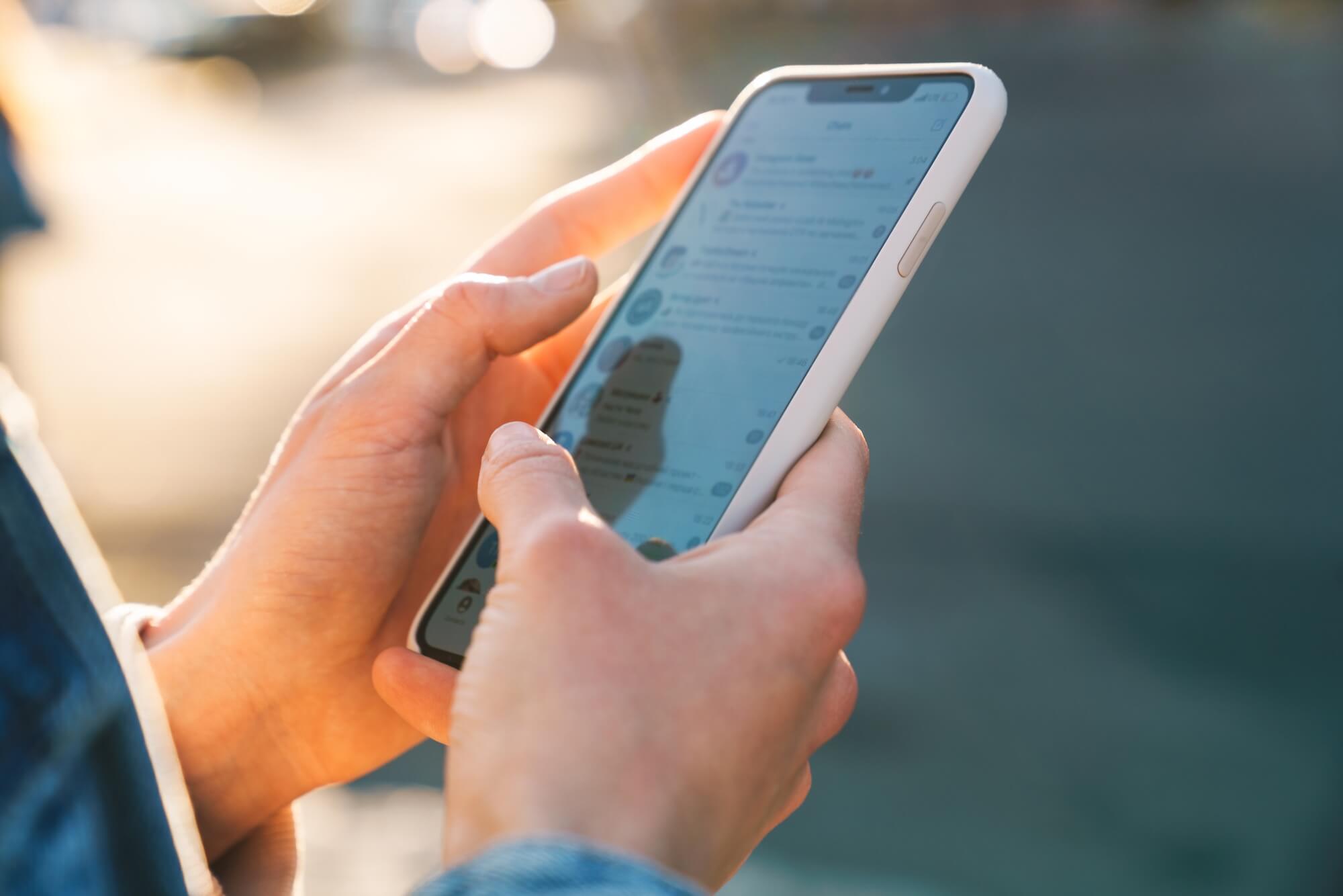 Person uses texting to engage with a franchise brand