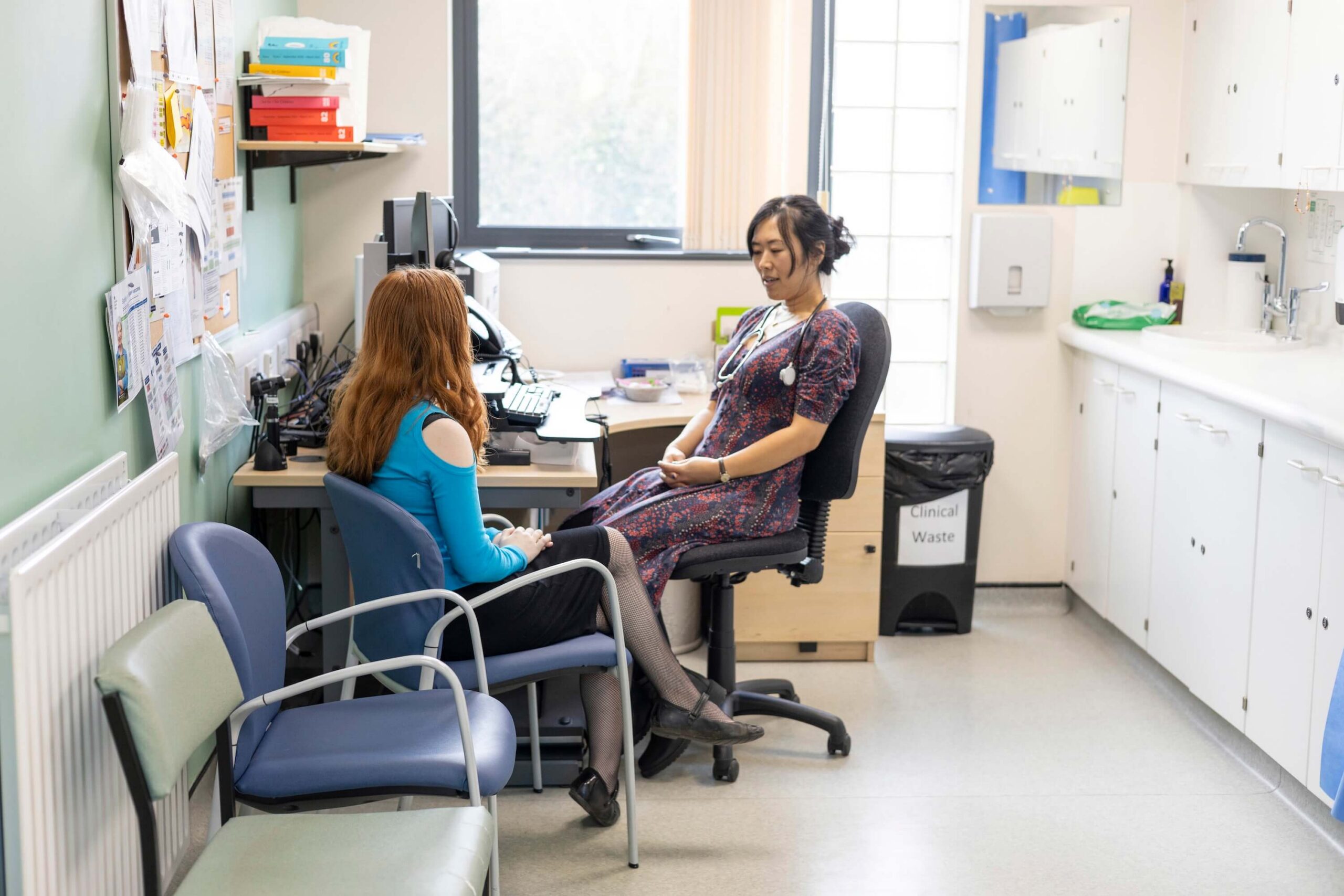 Doctor talks to a patient after scheduling with an AI agent