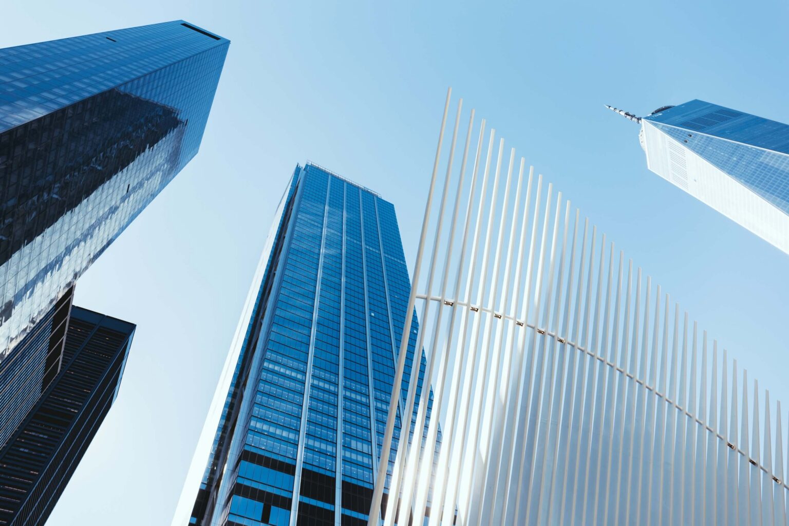 Low angle view of tall skyscrapers, representing enterprise AI needs
