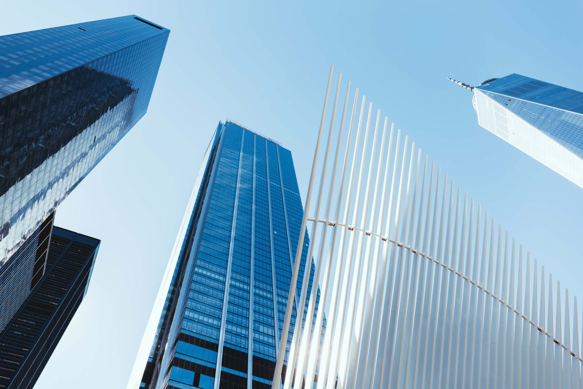 Low angle view of tall skyscrapers, representing enterprise AI needs