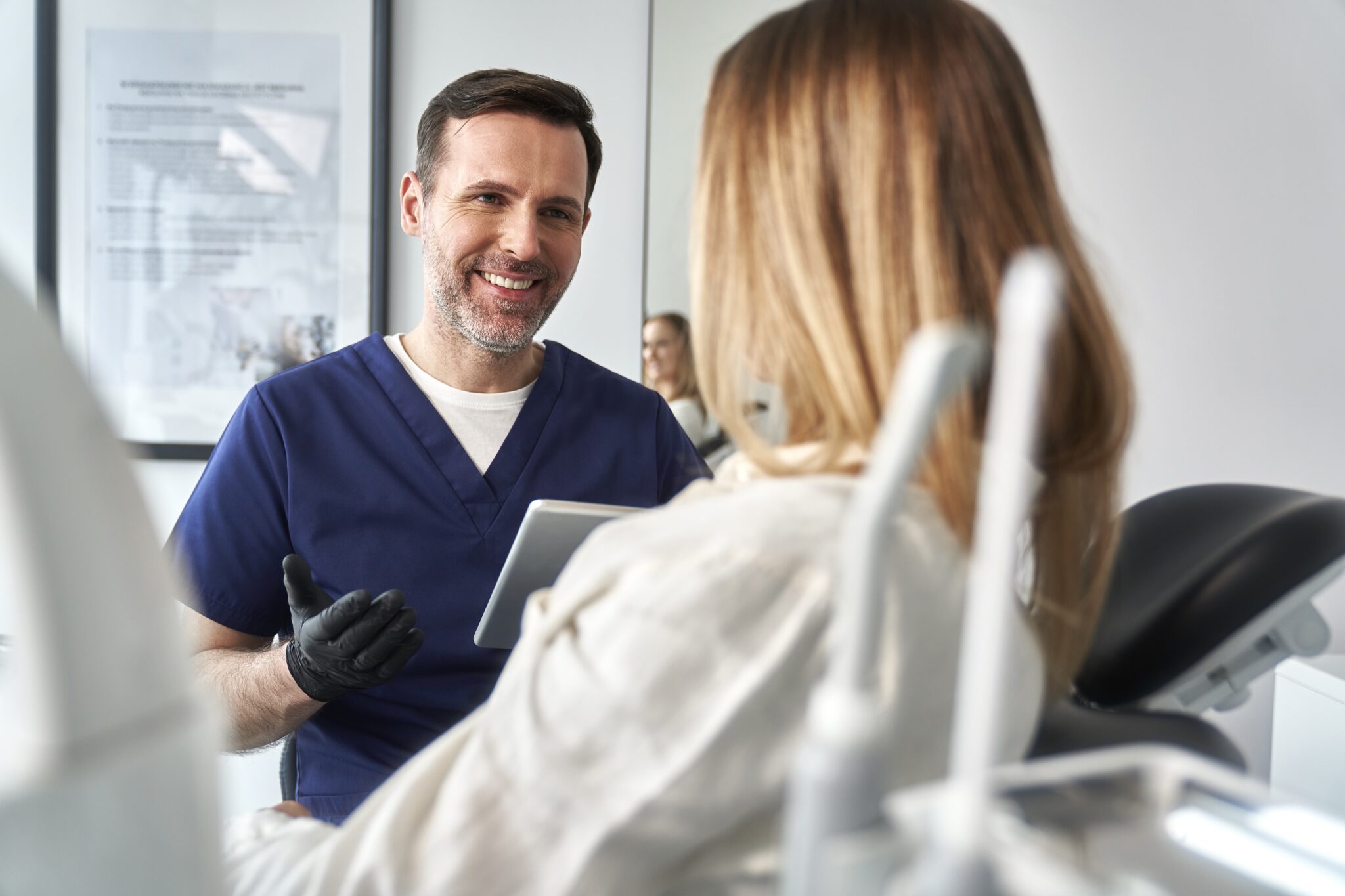 Healthcare professional speaks to patient who booked using conversational SMS