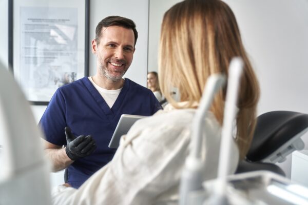 Healthcare professional speaks to patient who booked using conversational SMS