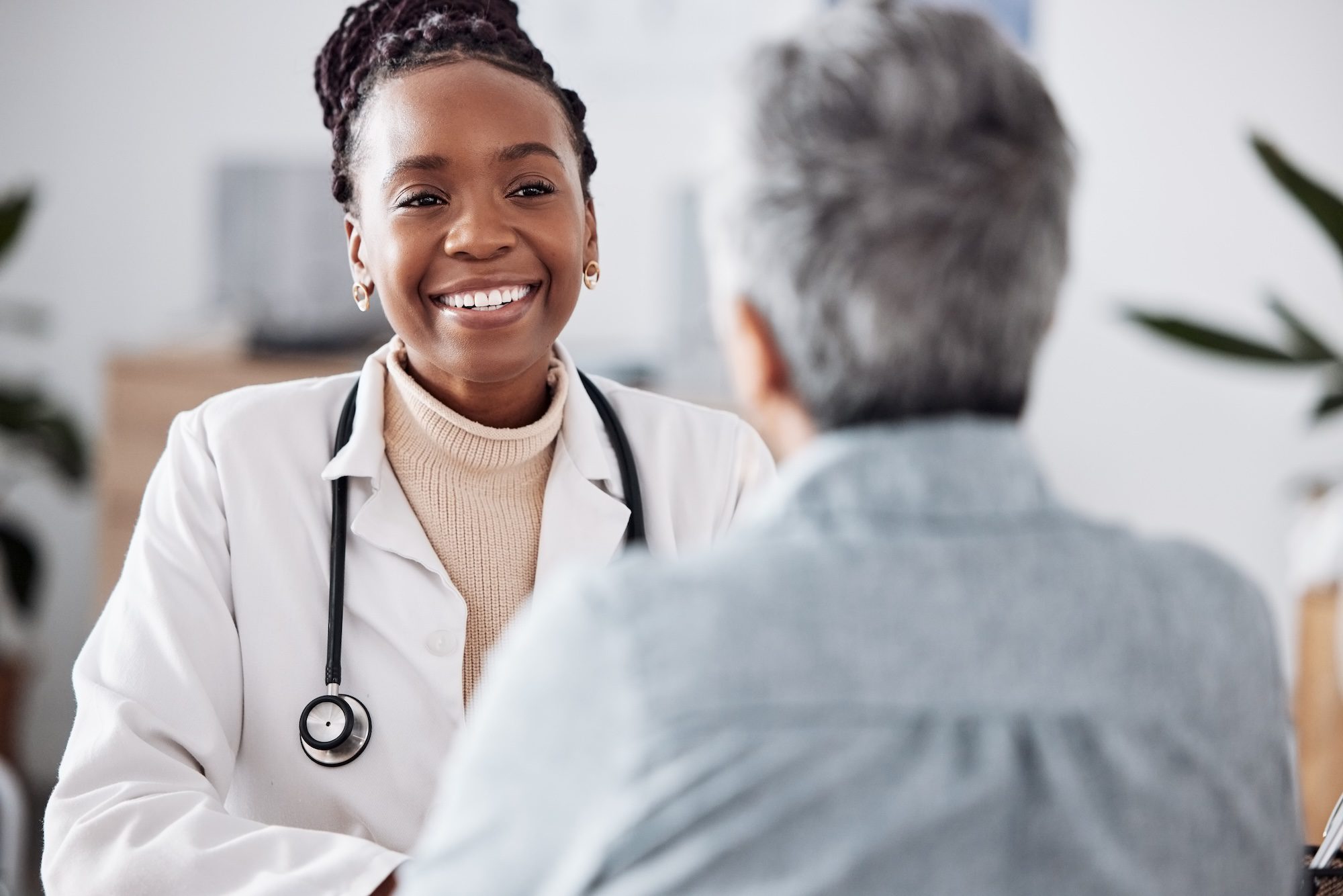 Doctor speaks with patient