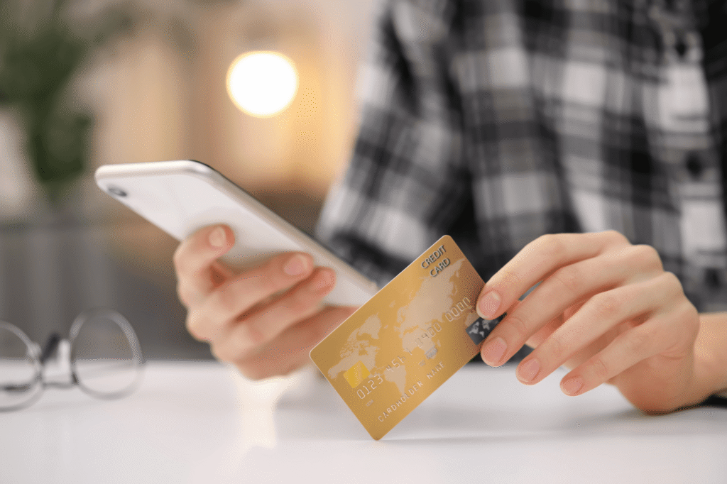 Person using SMS for collections to access a payment link