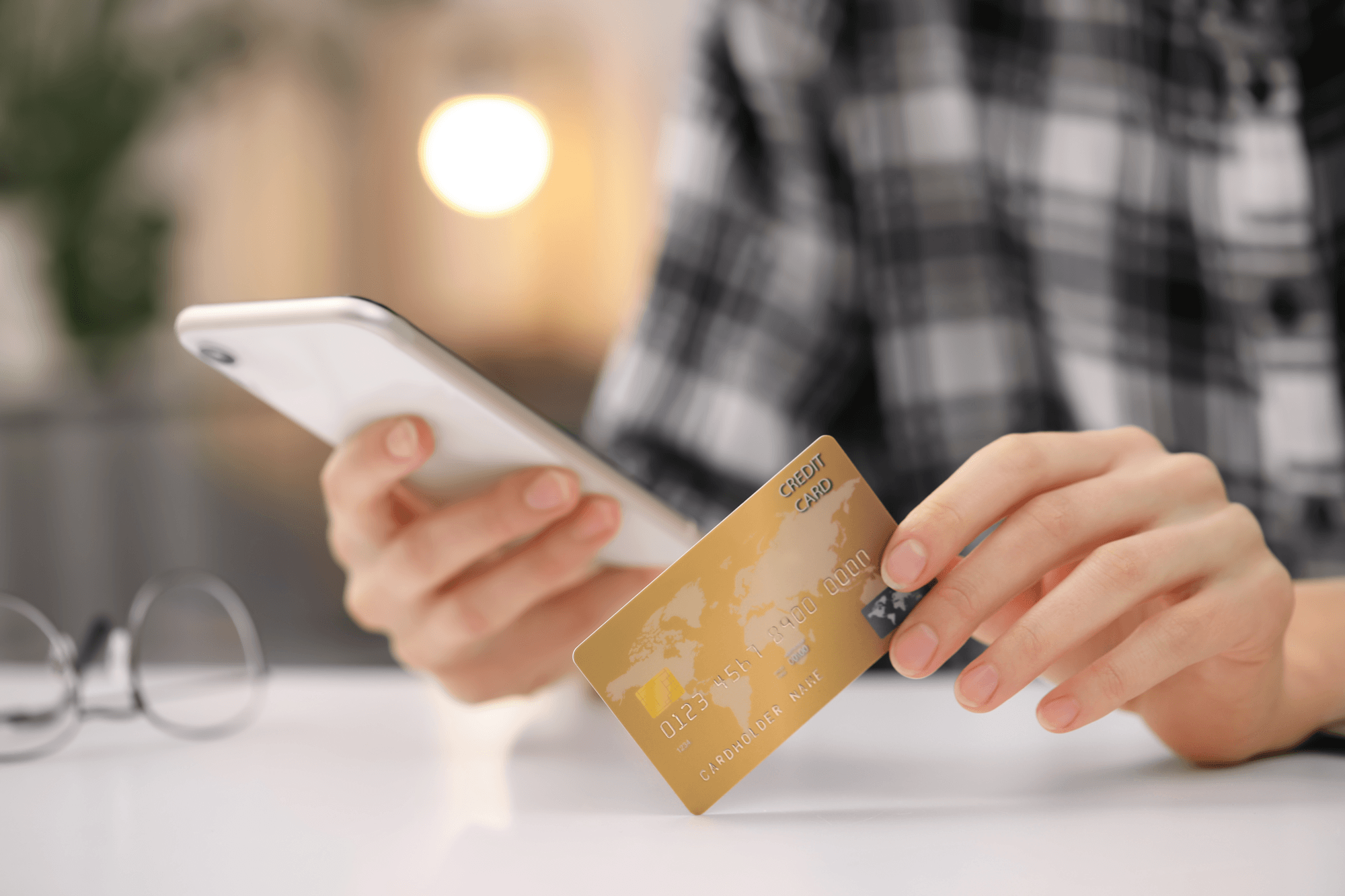 Person using SMS for collections to access a payment link